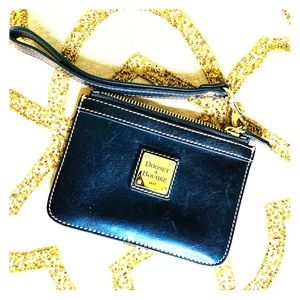 Authentic Dooney & Bourke black leather wristlet.